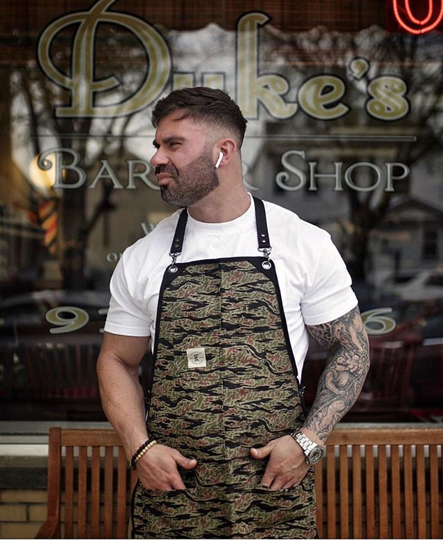 @xbigwesx wearing our TIGER STRIPE CAMO CORE APRON - Durable classic- length apron, perfect coverage for chest to mid thigh. SHOP NOW!!! Shop WWW.KNIFEFLAG.COM - link in bio #knifeandflag #knifeflag #survivalunion #barber #chef #mechanic #artist #tattoo #tigerstripecamo #camo