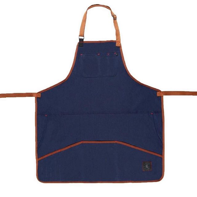 The Industry Apron, made from comfort stretch material (74% cotton, 24% poly, 2% spandex) with adjustable neck and waist straps. Waterproof! A large upper pocket with pen slots, jeans-style pockets on the sides, and large lower pockets provide all the room you’ll need to store go-to gadgets during a hectic day on the job. Extra long straps! At only $50, it’s one of our most affordable aprons.
.
.
.
#apron #knifeflag #knifeandflag #survivalunion #craftsman #barber #woodworking #maker #barberlife #mechanics #bartender #bar #tattooartist #craftsmanship #shoplocal